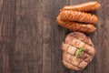 Top view grilled steak and sausage on a wooden background