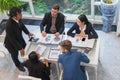 Group of businessmen meeting in a coffee shop Royalty Free Stock Photo