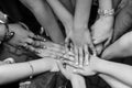 Top view group of children stacking hands outdoors. Concept of friendship, unity and teamwork Royalty Free Stock Photo
