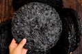 Top view group circle sheet dried black seaweed in basket, healthy raw material for vegan cuisine, vegetable of sea