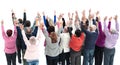 top view. group of diverse adults pointing at a white screen.