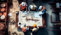 Top view of group of engineering team is meeting and planning construction work,Architects looking blueprint at Royalty Free Stock Photo