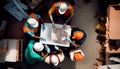 Top view of group of engineering team is meeting and planning construction work,Architects looking blueprint at Royalty Free Stock Photo