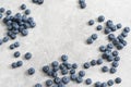 Top view of a group of fresh blueberries on gray background.