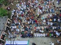 Top View of Group of Islamic people gathered in a cultural meeting during the corona with some people having masks in a village in