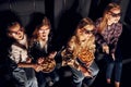 Top view. Group of kids sitting in cinema and watching movie together Royalty Free Stock Photo