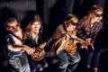 Top view. Group of kids sitting in cinema and watching movie together Royalty Free Stock Photo