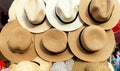 Top view of group straw hats with different design on market