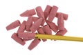 Red erasers with yellow pencil on a white background Royalty Free Stock Photo