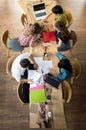 Top view Group of teenage friends working and meeting in team with reports