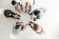 Top view on group of teenagers sitting in a circle during consul Royalty Free Stock Photo