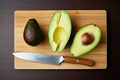 Top view of halves of fresh avocadoes. Generative AI