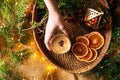 Coffee latte in a wicker basket tray with garland Royalty Free Stock Photo