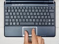 Top view hand using touchpad laptop keyboard Royalty Free Stock Photo