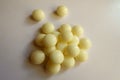 Top view of handful of yellow mints of xylitol Royalty Free Stock Photo