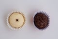 Top view of handmade Brazilian sweets: beijinho and brigadeiro coconut and chocolate candies.