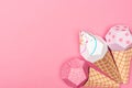 Top view of handmade colorful origami ice cream cones isolated on pink with copy space. Royalty Free Stock Photo