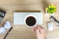 Top view of hands businessman holding cup coffee for relax after working on laptop. Royalty Free Stock Photo