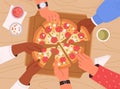 Top view of hands taking pizza slices from table at corporate party. Hungry friends eating Italian fast food together