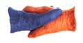 Top view of handshake of blue and orange gloves