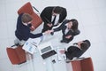 Top view.handshake, businessman and business woman over a Desk Royalty Free Stock Photo