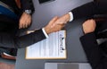 Top view handshake in after successful business meeting. Fervent Royalty Free Stock Photo