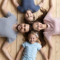 Top view of happy family hold hands showing unity