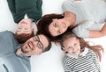 Top view. happy family lying on the floor Royalty Free Stock Photo