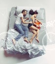 Top view of happy family with one newborn child in bedroom and their dreams . Royalty Free Stock Photo