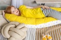 Top view happy future mother lying on comfortable bed hugging pillow for pregnant relaxing