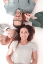 Top view. happy parents with children to relax by lying on the floor Royalty Free Stock Photo