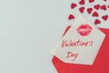 top view of happy valentines day postcard with lips print in envelope Royalty Free Stock Photo