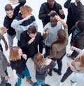 top view. happy young people giving each other a high five . Royalty Free Stock Photo