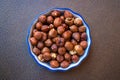 Top view of hazelnuts in porcelain bowl - Image Royalty Free Stock Photo