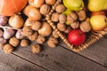 Top view of colorful vegetables and fruits. Autumnal healthy harvest lying flat on old natural boards. Royalty Free Stock Photo