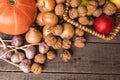 Top view of colorful vegetables and fruits. Autumnal healthy harvest lying flat on old natural boards. Royalty Free Stock Photo