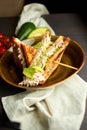 Top view of Healthy Sandwich toast with lettuce, ham, cheese and tomato on a wooden background Royalty Free Stock Photo