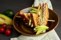 Top view of Healthy Sandwich toast with lettuce, ham, cheese and tomato on a wooden background Royalty Free Stock Photo