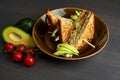 Top view of Healthy Sandwich toast with lettuce, ham, cheese and tomato on a wooden background Royalty Free Stock Photo