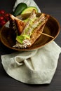 Top view of Healthy Sandwich toast with lettuce, ham, cheese and tomato on a wooden background Royalty Free Stock Photo