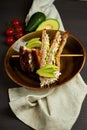 Top view of Healthy Sandwich toast with lettuce, ham, cheese and tomato on a wooden background Royalty Free Stock Photo