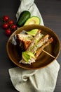 Top view of Healthy Sandwich toast with lettuce, ham, cheese and tomato on a wooden background Royalty Free Stock Photo