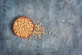 Top view on healthy and tasty pine nuts in small wooden rustic bowl Royalty Free Stock Photo