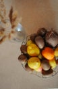Top view of healthy variety of food with rustic plant. A bowl of tropic fruits