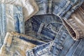 Top view Heap of blue jeans texture
