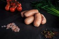 top view on heap of short sausages with dill and tomatoes Royalty Free Stock Photo