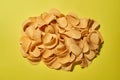 Top view of heap of tasty and appetizing chips