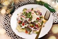 Top view of herring salad with potato and apple for Christmas