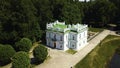 Top view of historic building with garden and pond. Creative. Beautiful park and garden with Baroque estate. Tourists Royalty Free Stock Photo