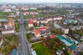 Top view of the historical center of the city. Flying a drone over the roofs of houses and a bridge over the river. The long main